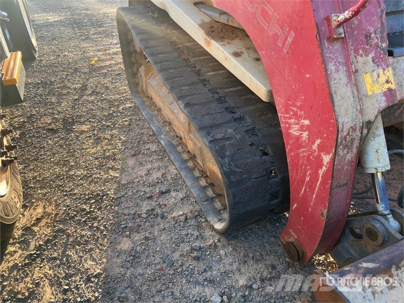 Takeuchi TL12 لوادر انزلاقية التوجيه