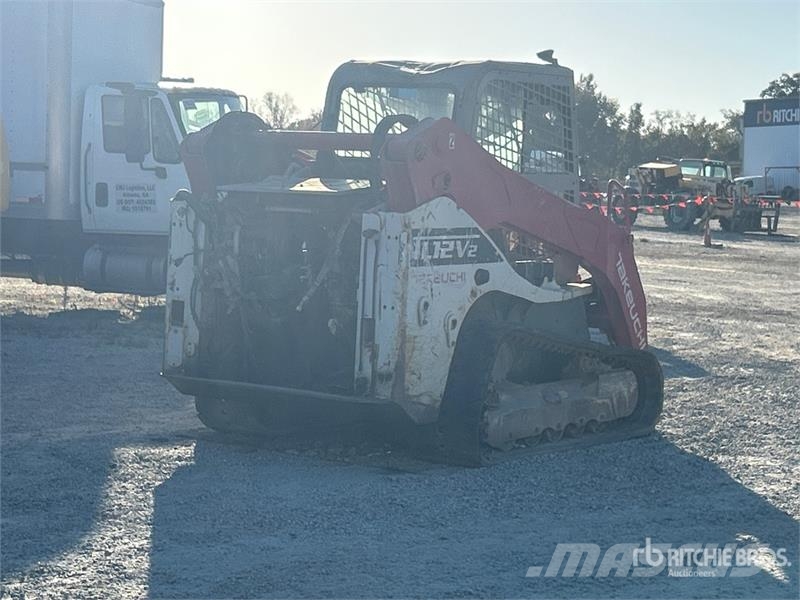 Takeuchi TL12V2 لوادر انزلاقية التوجيه