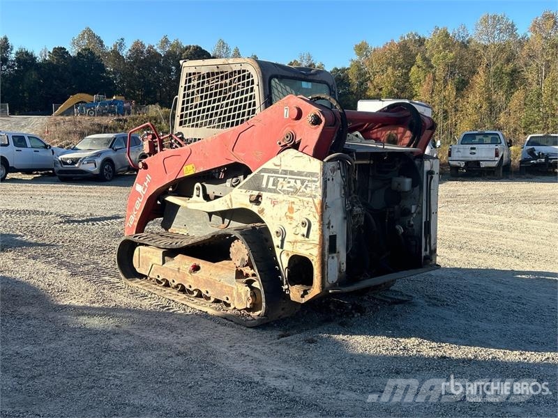 Takeuchi TL12V2 لوادر انزلاقية التوجيه
