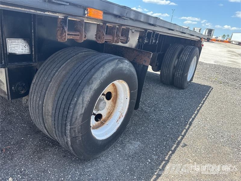 Transcraft L-2000H 48 ft T/A Spread Axle Flatbed Trailer Platformas/izkraušana no sāniem