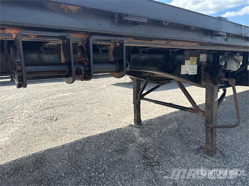 Transcraft L-2000H 48 ft T/A Spread Axle Flatbed Trailer Platformas/izkraušana no sāniem