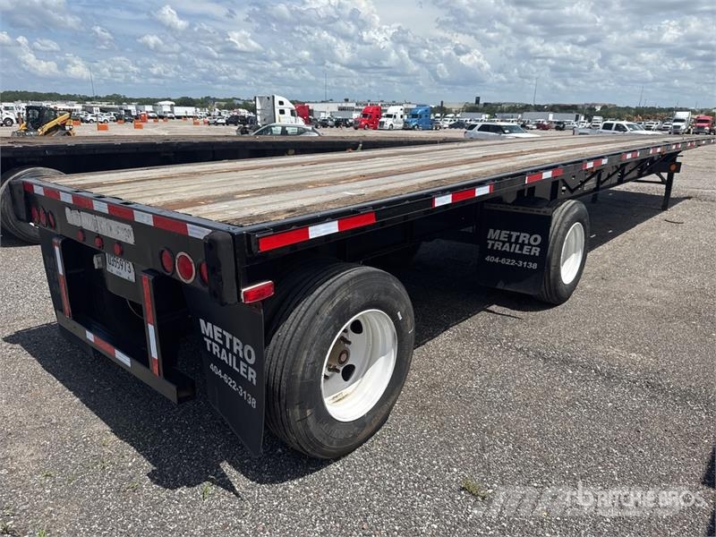 Transcraft L-2000H 48 ft T/A Spread Axle Flatbed Trailer Platformas/izkraušana no sāniem
