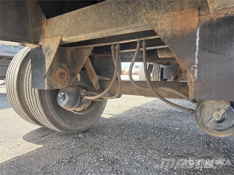 Transcraft L-2000H 48 ft T/A Spread Axle Flatbed Trailer Platformas/izkraušana no sāniem