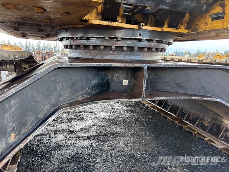 CAT 324DFMLL Heel Boom Log Loader لوادر بذراع مفصلي