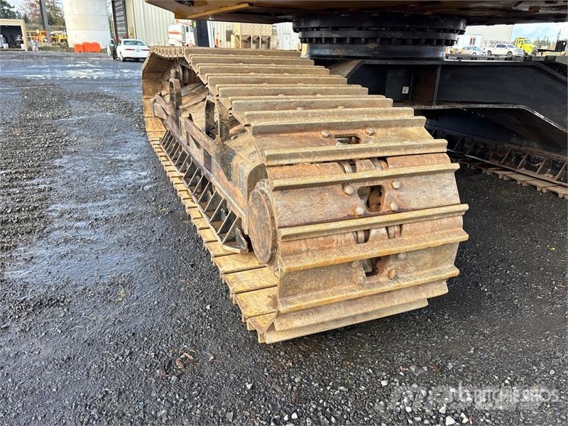 CAT 324DFMLL Heel Boom Log Loader لوادر بذراع مفصلي
