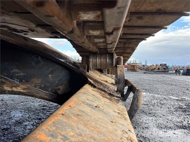 CAT 324DFMLL Heel Boom Log Loader لوادر بذراع مفصلي