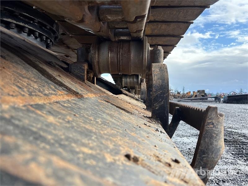 CAT 324DFMLL Heel Boom Log Loader لوادر بذراع مفصلي