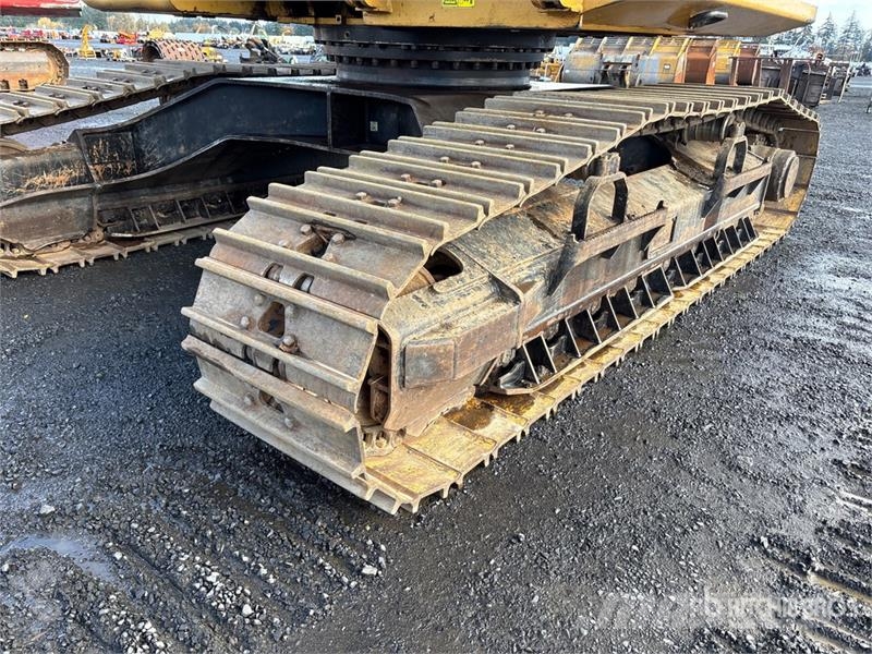 CAT 324DFMLL Heel Boom Log Loader لوادر بذراع مفصلي