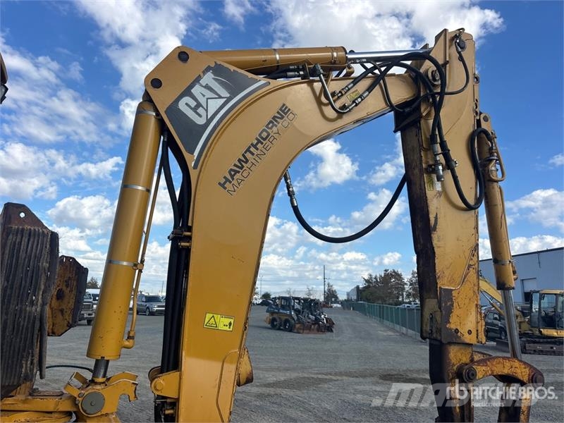 CAT 446D لوادر ذات جرافات عكسية
