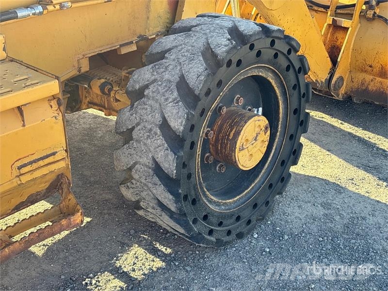 CAT 446D Rovokopači