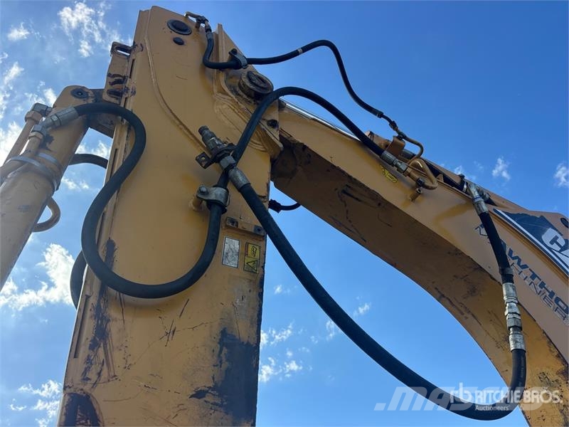 CAT 446D لوادر ذات جرافات عكسية