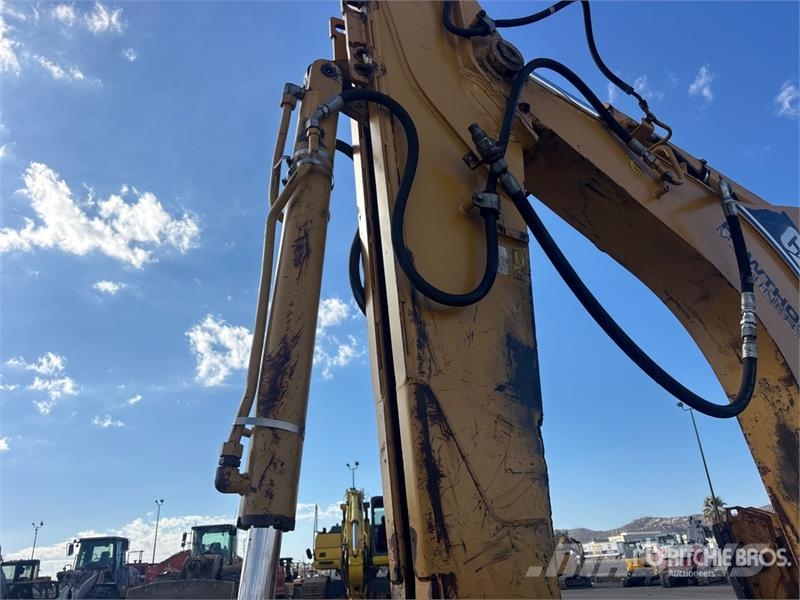 CAT 446D لوادر ذات جرافات عكسية