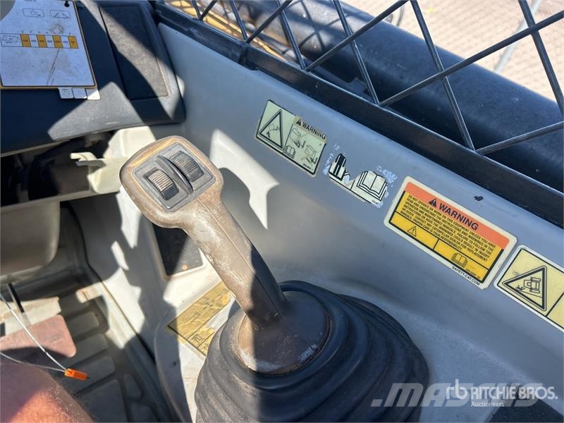CAT TH580B Телескопические погрузчики