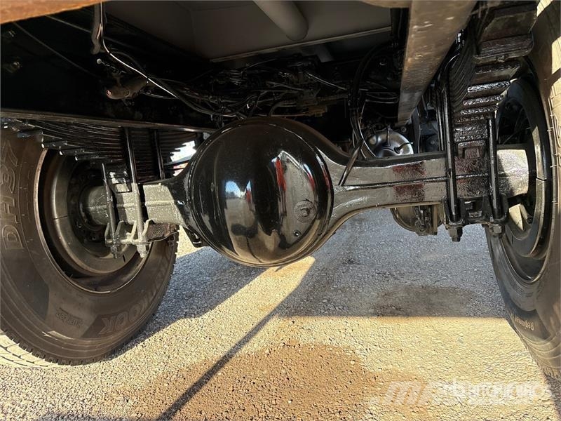 International MV607 2000 gal 4x2 Water Truck Поливочные машины