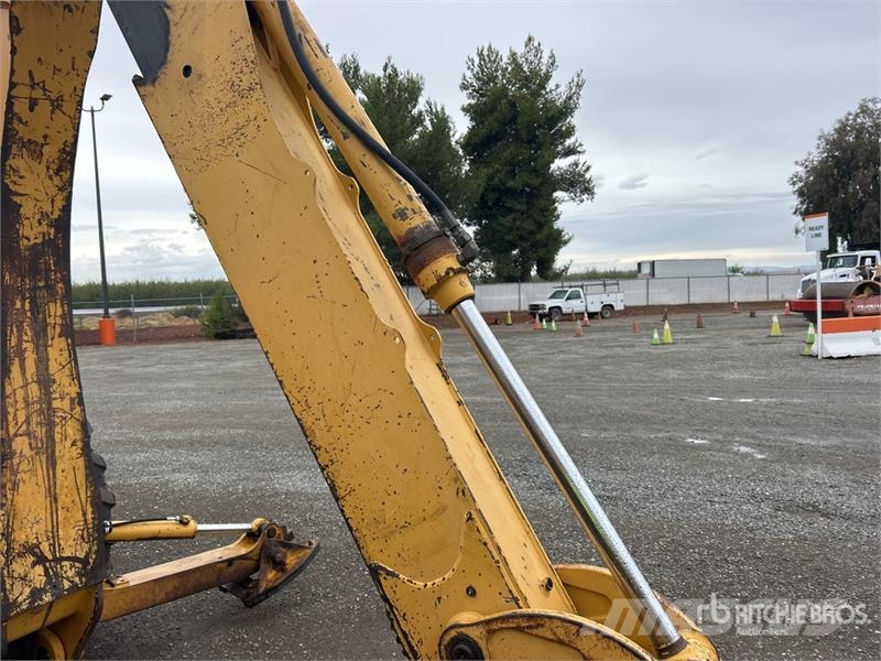 John Deere 310E Экскаваторы-погрузчики