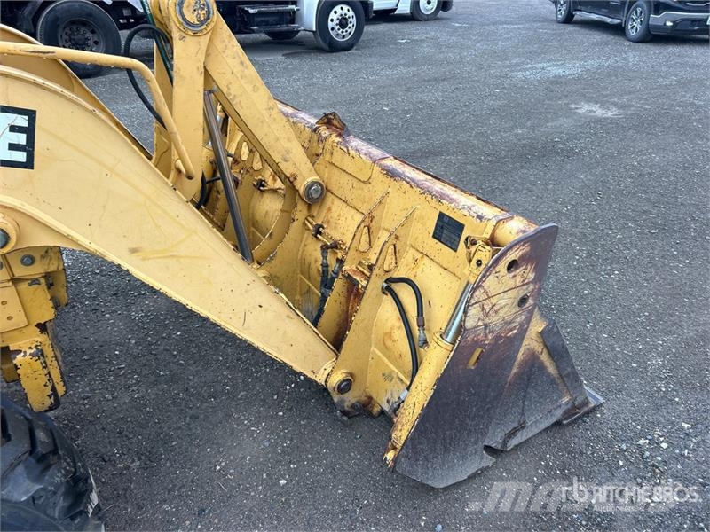 John Deere 310E Экскаваторы-погрузчики