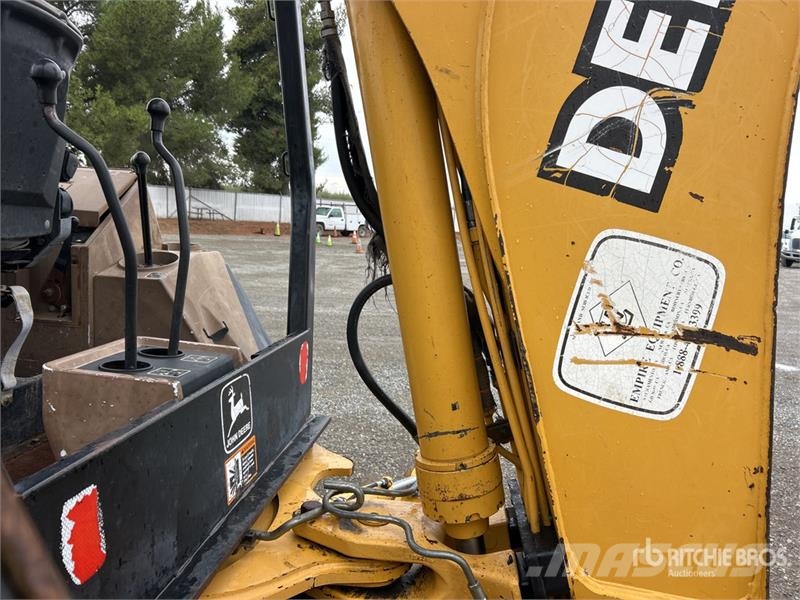 John Deere 310E Экскаваторы-погрузчики