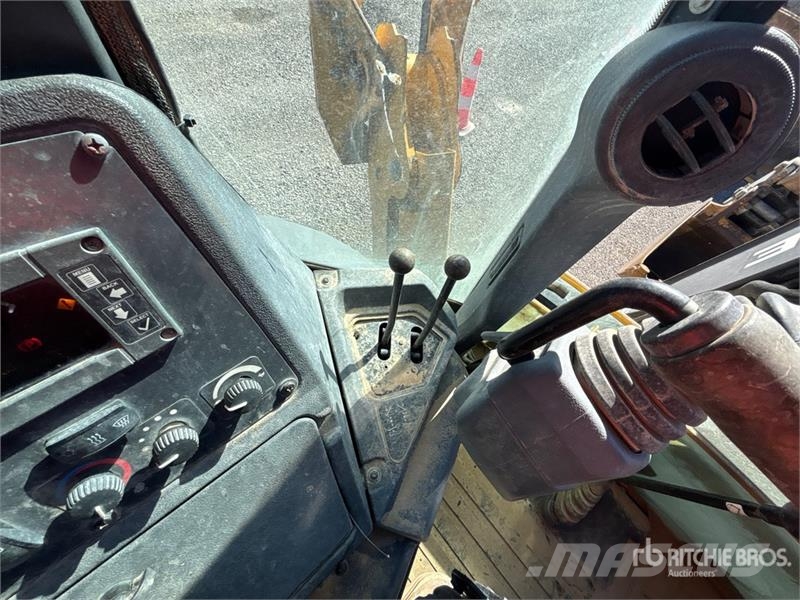 John Deere 310SL Terne