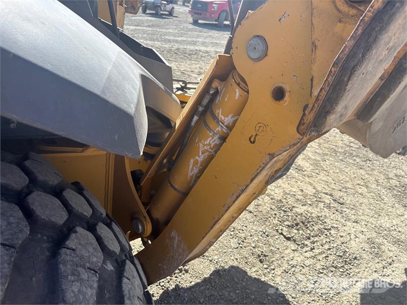 John Deere 410 TLB's