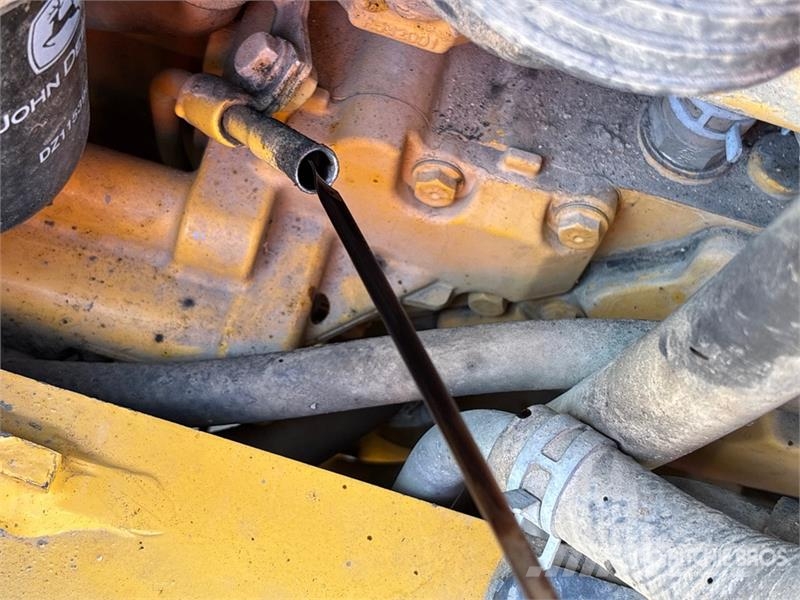 John Deere 410L لوادر ذات جرافات عكسية