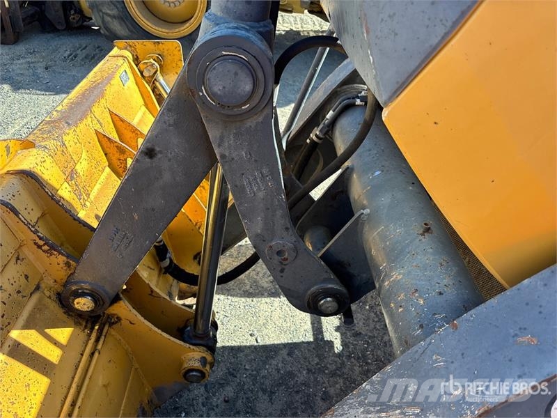 John Deere 410L لوادر ذات جرافات عكسية