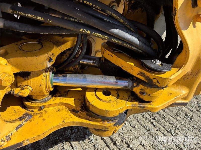John Deere 410L لوادر ذات جرافات عكسية