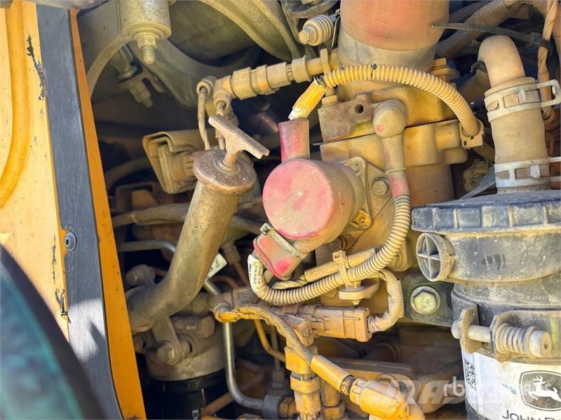 John Deere 410L لوادر ذات جرافات عكسية