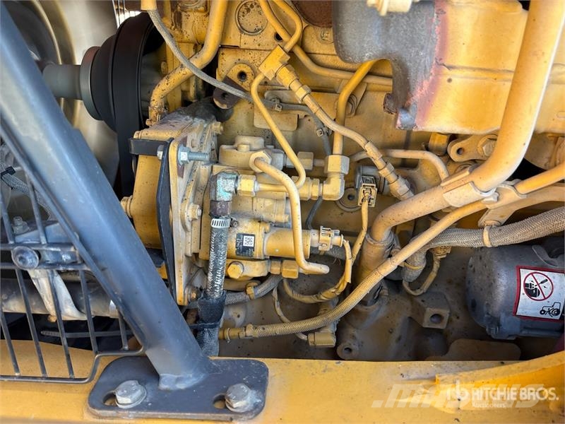 John Deere 410L لوادر ذات جرافات عكسية