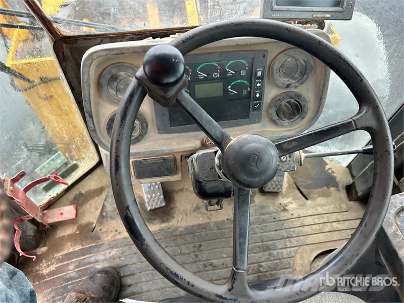 John Deere 644J Фронтальні навантажувачі