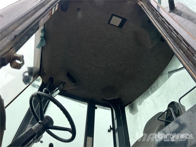 John Deere 644J Фронтальні навантажувачі