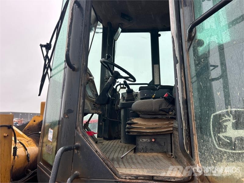 John Deere 644J Фронтальні навантажувачі