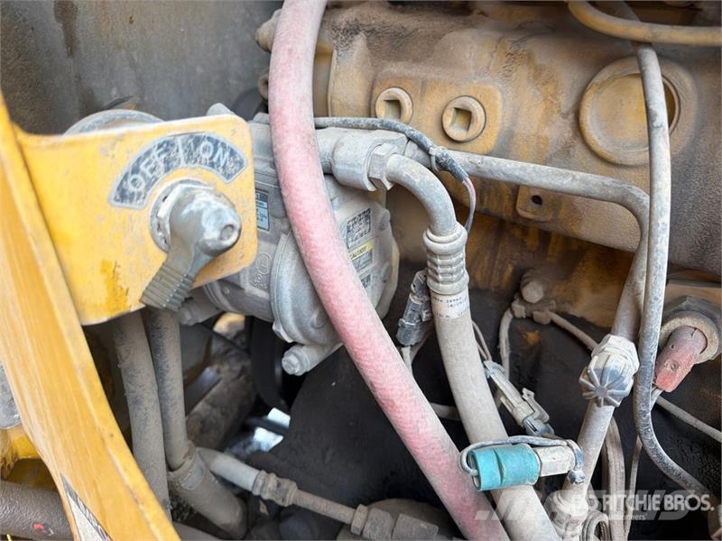 John Deere 770CH Грейдери