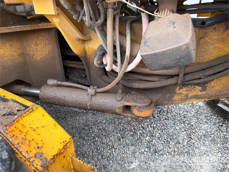 John Deere 770CH Грейдери