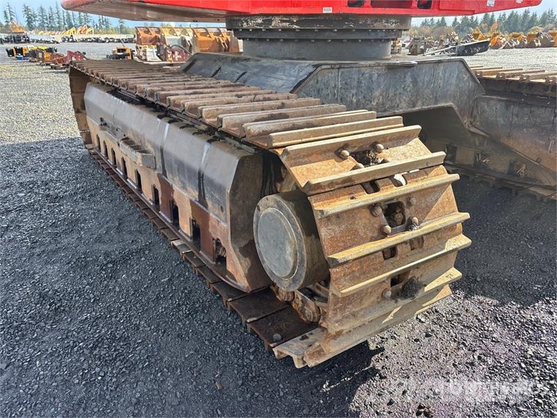 Madill 3800C Gelenkausleger Lader