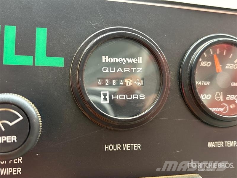 Madill 3800C Gelenkausleger Lader