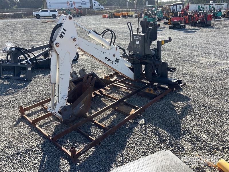Melroe 911 Skid Steer Backhoe Ekskavaatorikopad ja lisaseadmed