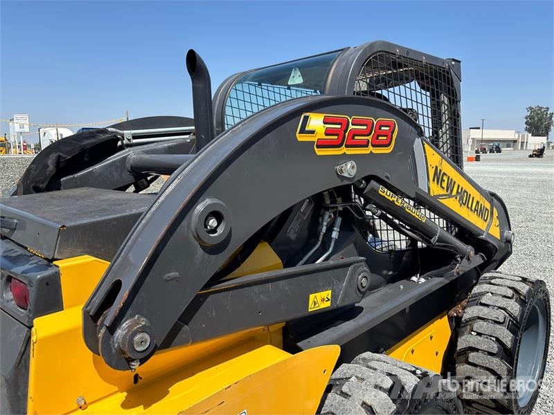 New Holland L328 Skid Steer Loader Lietoti riteņu kompaktiekrāvēji
