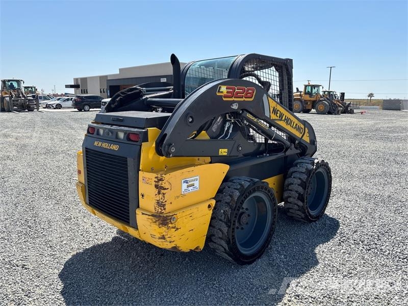 New Holland L328 Skid Steer Loader Lietoti riteņu kompaktiekrāvēji