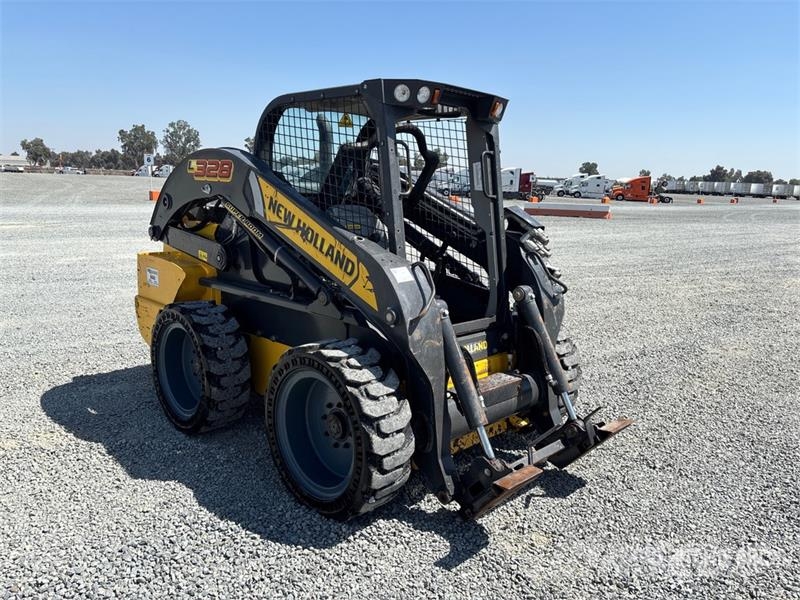 New Holland L328 Skid Steer Loader Lietoti riteņu kompaktiekrāvēji