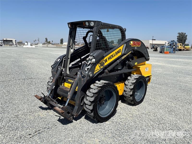 New Holland L328 Skid Steer Loader Lietoti riteņu kompaktiekrāvēji