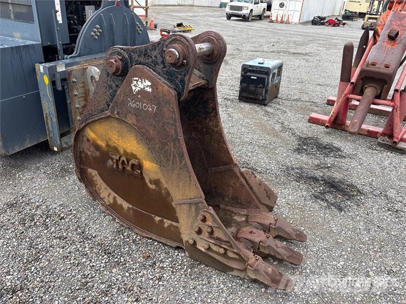 TAG 24 in Excavator Bucket Benne