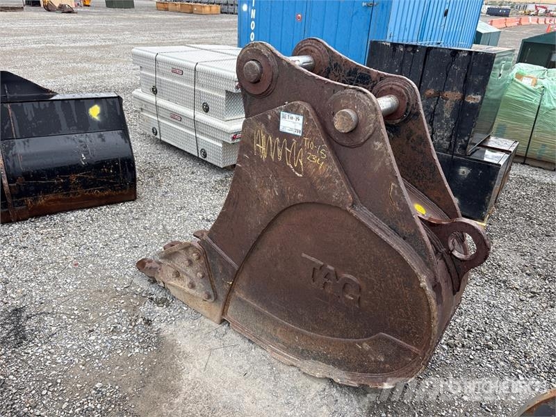 TAG 24 in Excavator Bucket Benne