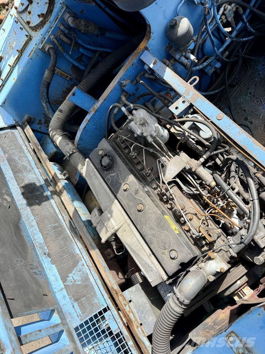 Fuchs MHL340 Excavadoras de manutención