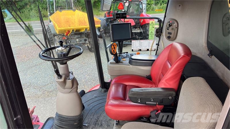 Case IH Axial Flow 9120 Med 30-fods skærebord og vogn. حصادات
