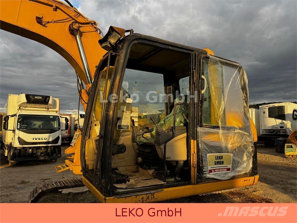 CAT 311C Mit Zwei Löffeln Rupsgraafmachines