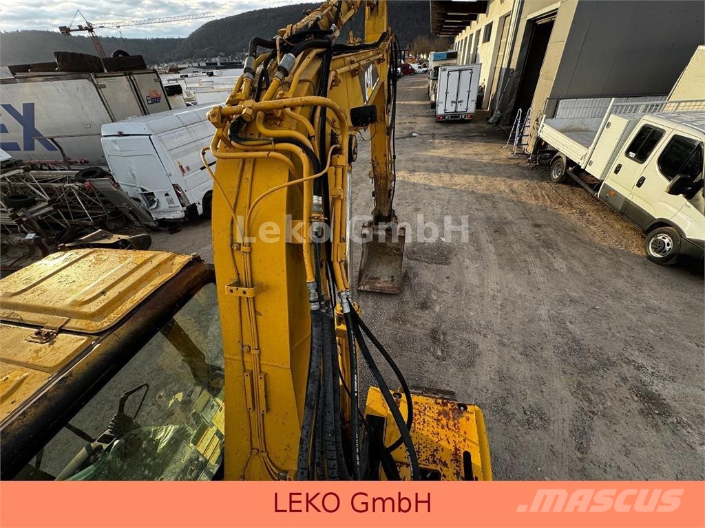 CAT 311C Mit Zwei Löffeln Rupsgraafmachines