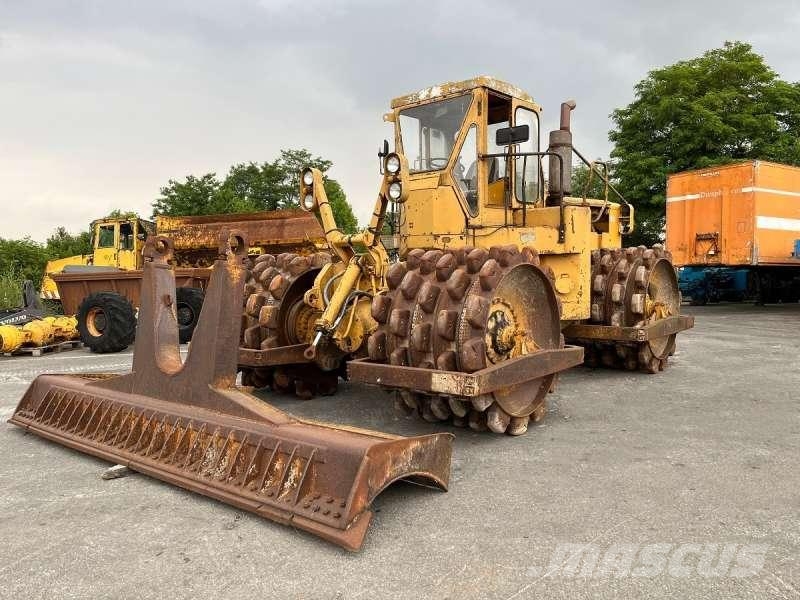 CAT 825 + porte engins Kompaktori zemlje