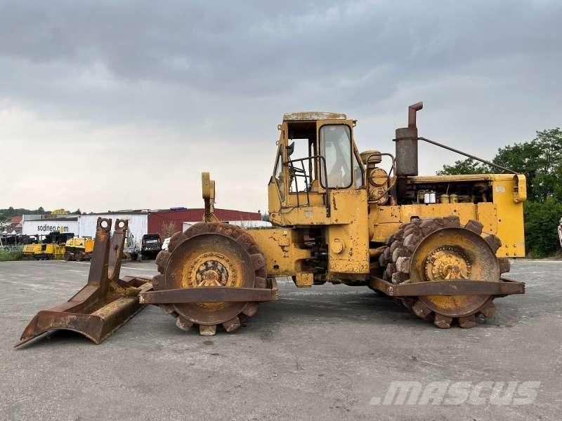 CAT 825 + porte engins Kompaktori zemlje