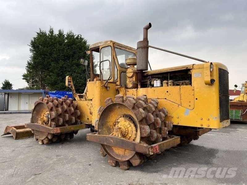 CAT 825 + porte engins Kompaktori zemlje