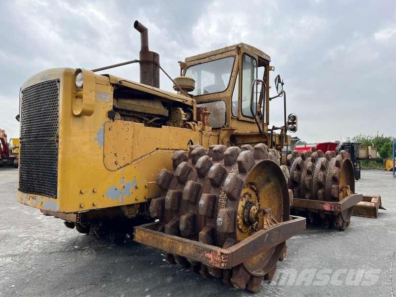 CAT 825 + porte engins Kompaktori zemlje